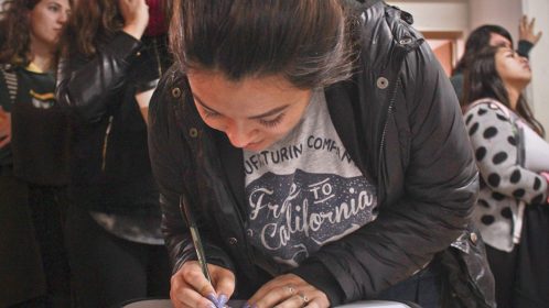 Acto de firma de beca